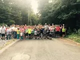 A large community group gathered outdoors
